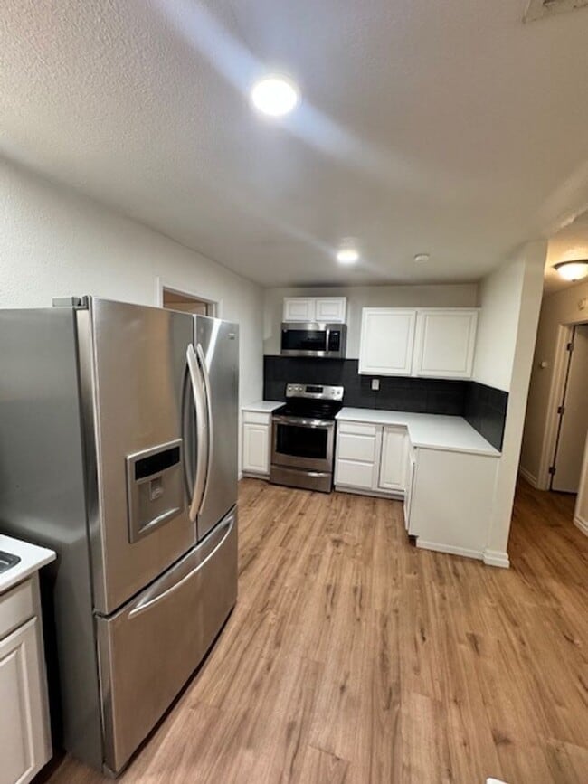 Building Photo - Conveniently Located Home with Attached Studio!