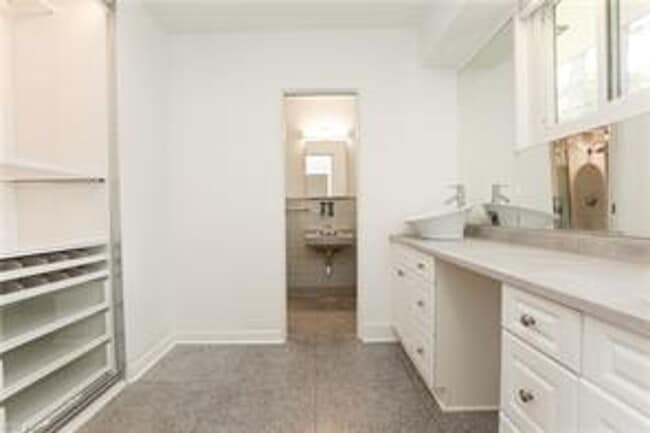 Building Photo - 4 BED/3 BATH LOCATED IN A WATERFRONT COMMU...