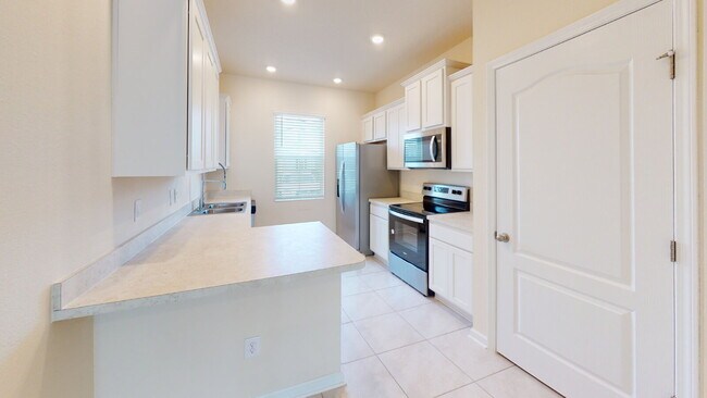 Building Photo - "Charming 3-Bedroom Townhouse Retreat on Oak Mill Road – Spacious 1308 Sq Ft with 2 Full Baths in...