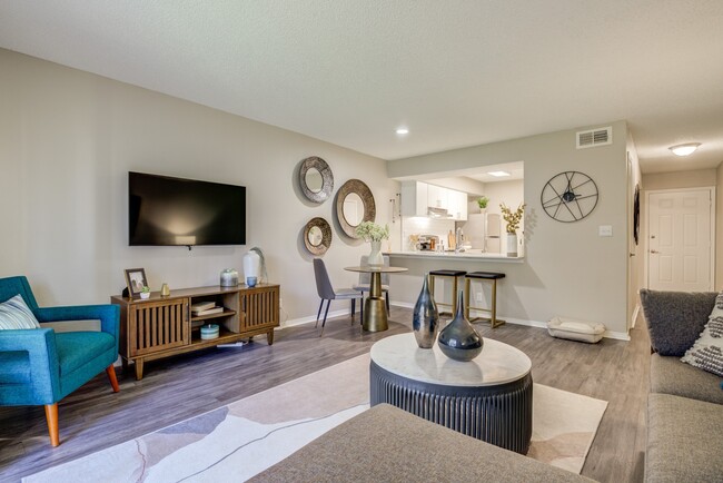 Newly Renovated Open Floor Plan Living Space - The Invitational Apartments