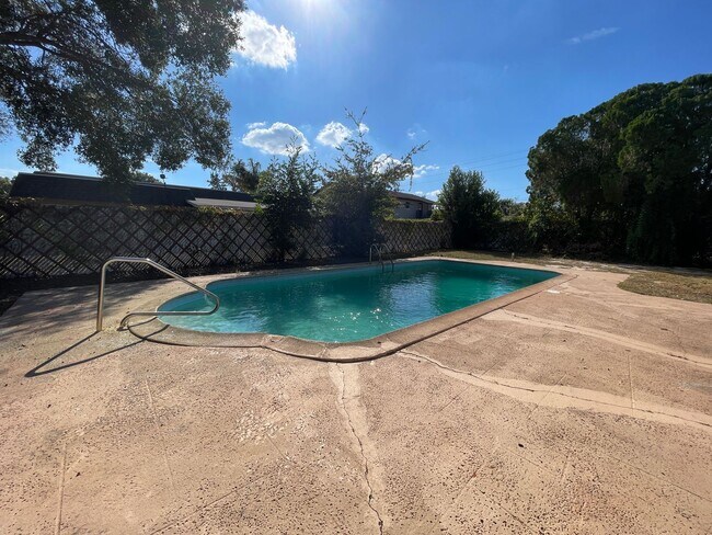 Building Photo - Charming 4-Bedroom, 2-Bathroom Home Pool w...