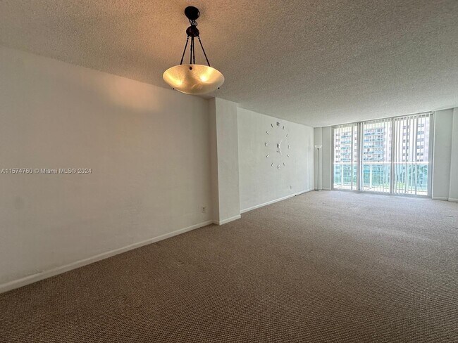 Building Photo - 19380 Collins Ave