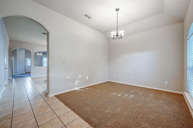 Foto del edificio - 6151 Grassy Haven Ln