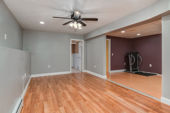 Living room area on lower level - 101 Allston Street