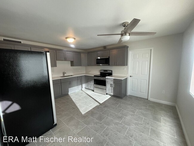 Building Photo - 3 br, 2 bath House - 128 S 6th Avenue