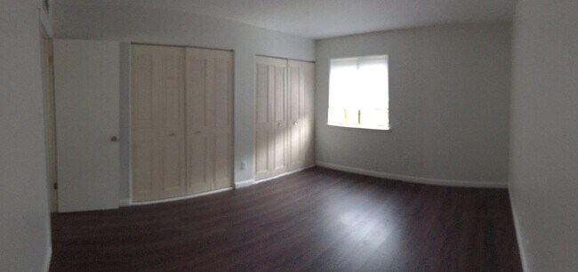 Bedroom with wall to wall closets - 208 Meadow Woods Ln
