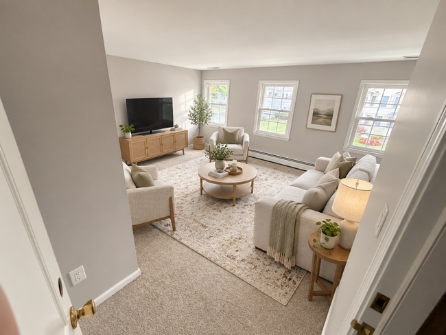 Living Room-Virtually furnished to show potential layout - 23 Cherry St