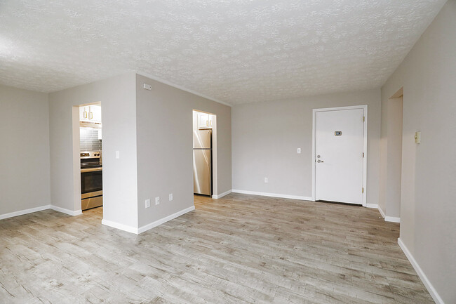 View of Living Room, Dining Room & Kitchen - The Evalee Apartments