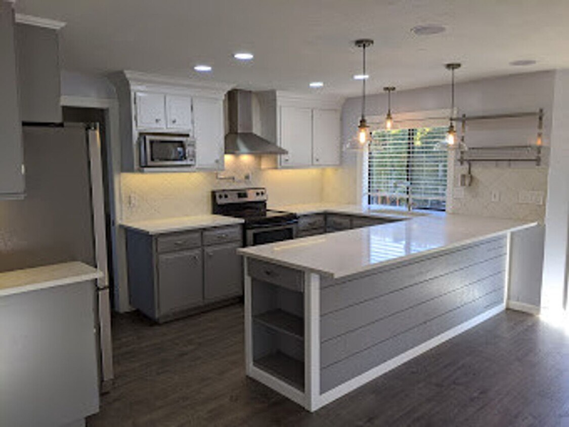 Foto principal - Updated 3-Bedroom, 2.5-Bath Home ~ Solid S...