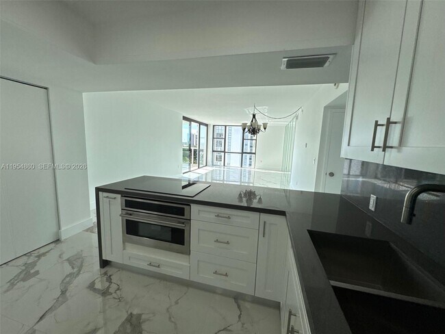 Building Photo - 3675 N Country Club Dr