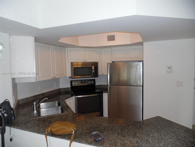 Building Photo - 8911 Collins Ave