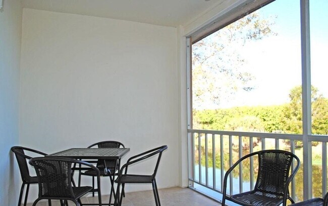 Building Photo - ** ADORABLE 2ND FLOOR 2/2 CONDO CANAL VIEW...