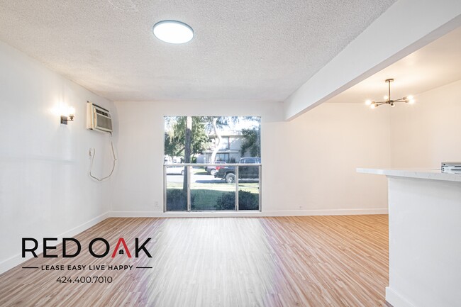 Building Photo - Spacious, Bright and Completely Remodeled ...
