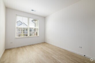 Primary Bedroom - The Belvedere Apartments