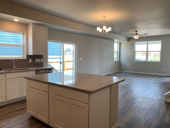 Building Photo - BUILT IN 2021 4 BEDROOM HOME LOCATED in th...