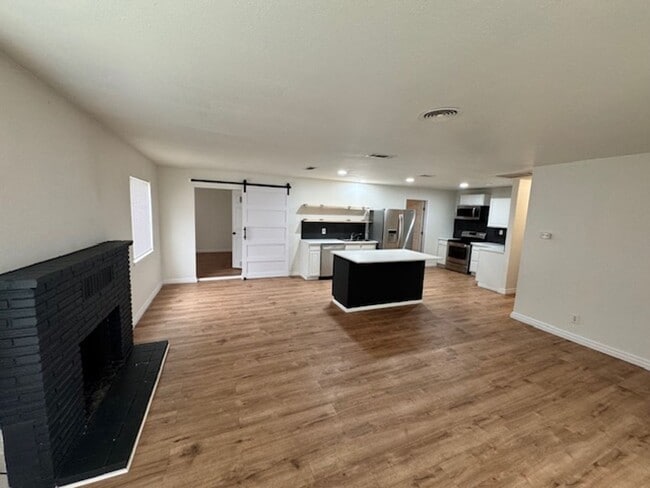 Building Photo - Conveniently Located Home with Attached Studio!