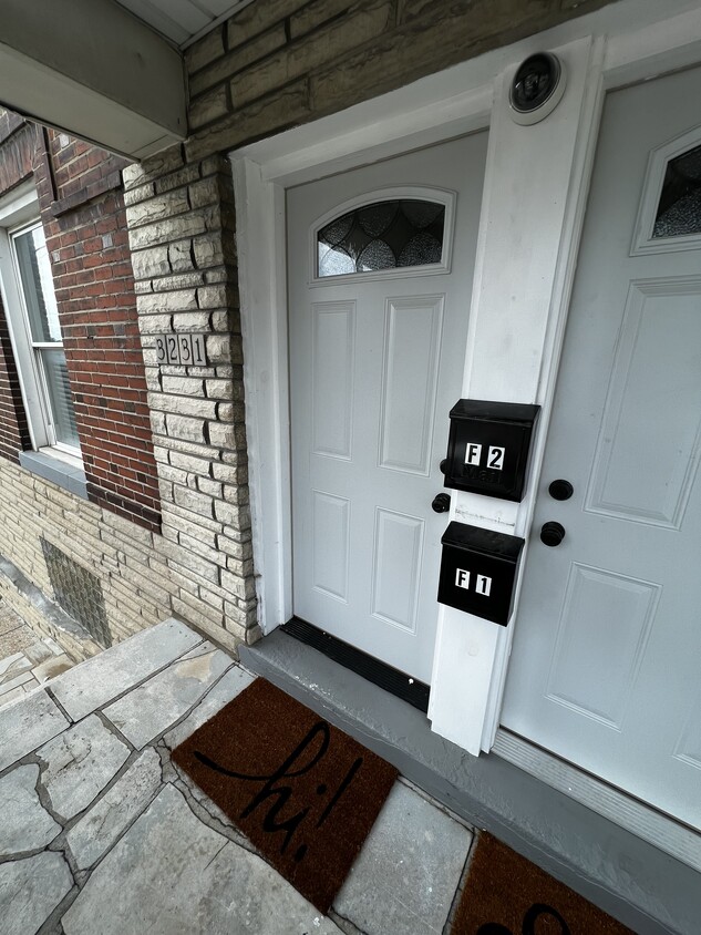 Front Door, Listed Unit is F1 - 3231 Gravois Ave