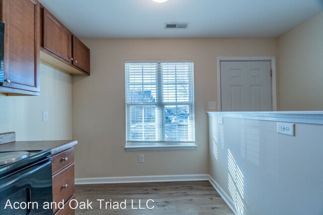 Building Photo - 2 br, 2.5 bath House - 404 Mourning Dove T...