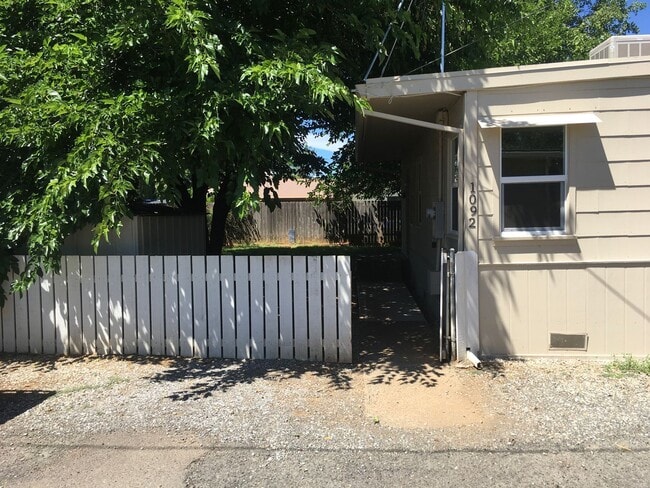 Building Photo - Home with Fenced Yards