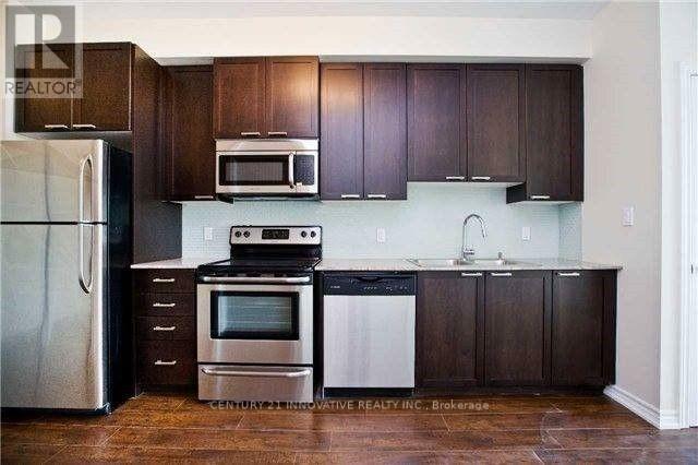 Photo du bâtiment - 1328 Birchmount Rd