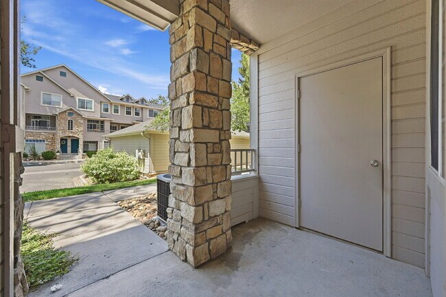 Building Photo - $1,745.95 - Ground-Level 1 Bed + Flex Room | 1.5 Bath Condo with Community Pool