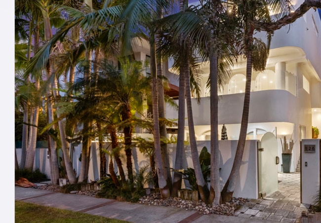 Fronted by a quiet, tree-lined walk street with lush greenery. - 120 Mast Mall