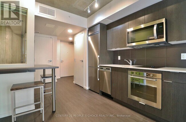 Building Photo - 105-1105 Champagne Ave S