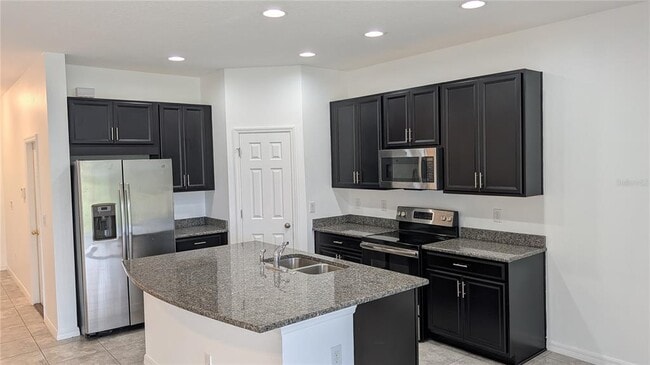 Building Photo - 7046 Grand Elm Dr