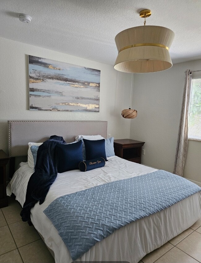 Large room with private bath that has a king size bed - 7702 NE 3rd Ct