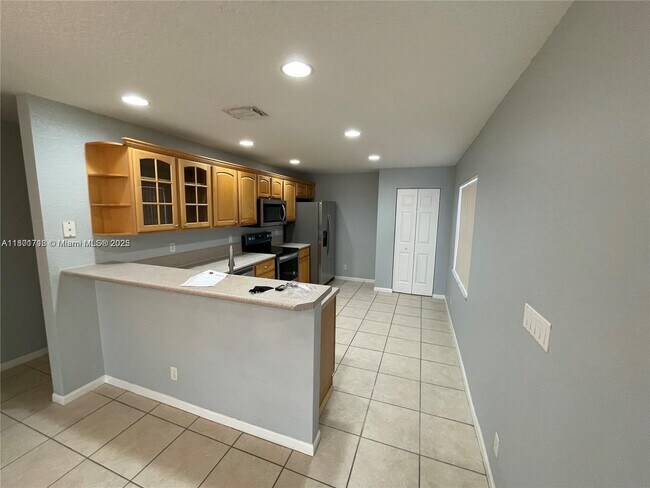 Foto del edificio - 6597 Country Winds Cove