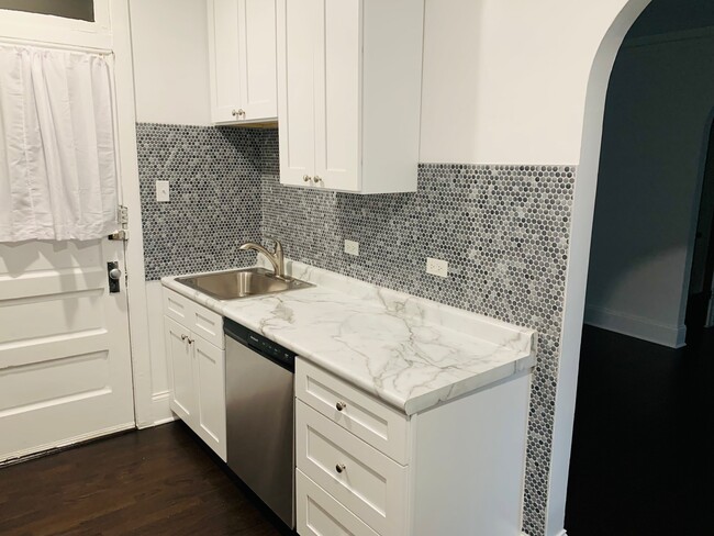 Foto del edificio - 5802 N Mason Ave