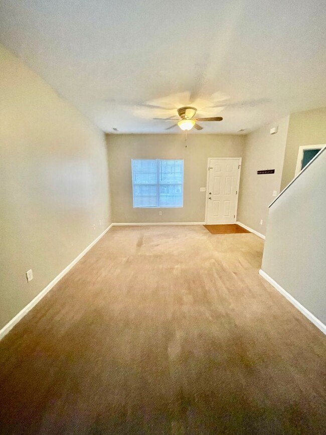 Foto del edificio - This two-story, 4-bedroom, 2-bath duplex in Fort Mill, SC sits on a corner lot