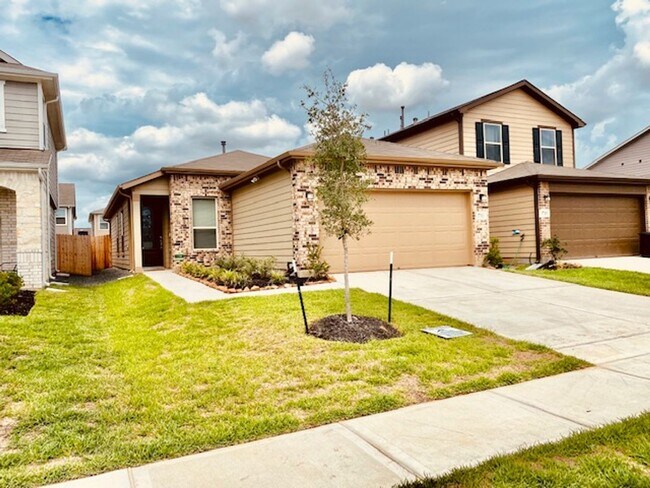 Building Photo - Willow Wood community features a brick ele...