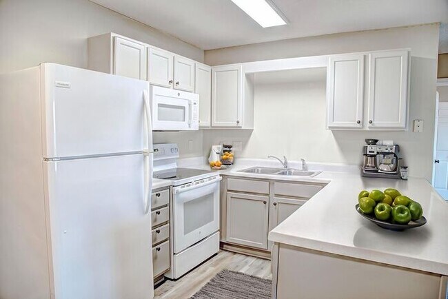 Building Photo - Stress-Free Beach Living with our pet frie...