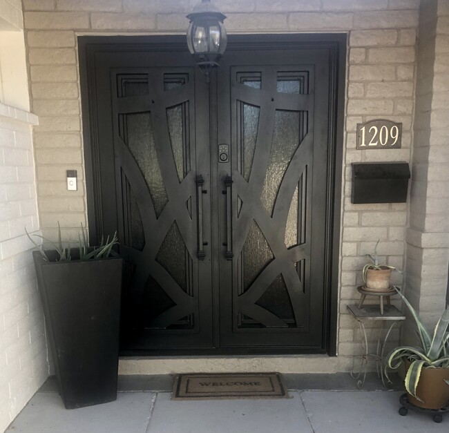 Iron Front Door - 1209 E Campus Dr