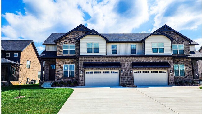 Building Photo - Elegant All-Brick Townhome in a Gated Comm...