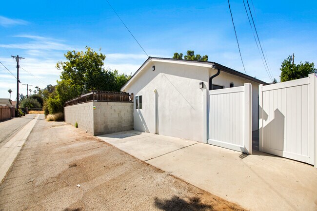 Private access to apartment through the alley and a dedicated parking spot. - 23046 Saticoy St