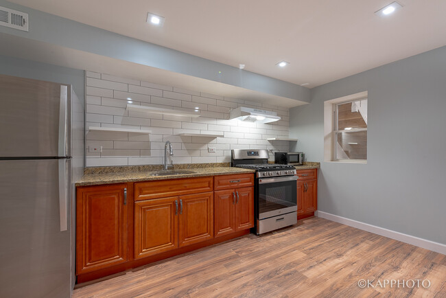 Building Photo - 4332 S Langley Ave