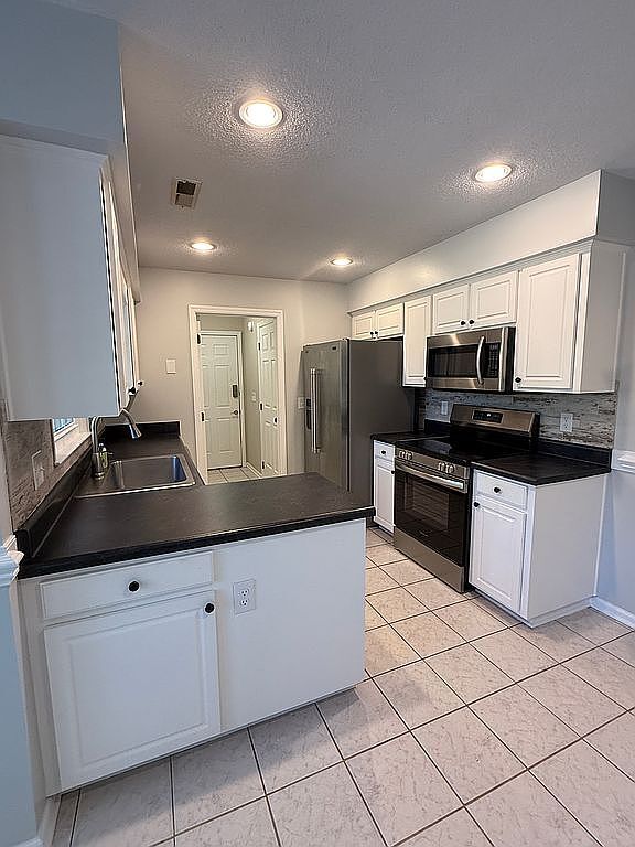 Foto del edificio - 7303 Flintrock Ct