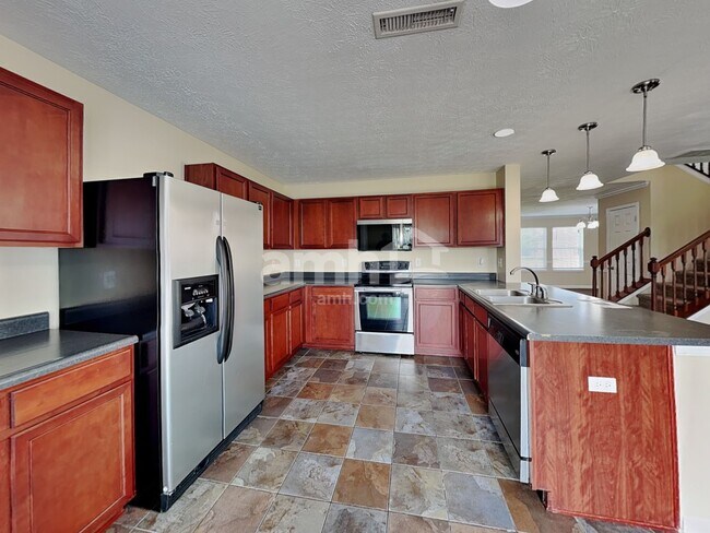 Building Photo - 8193 Tasman Dr