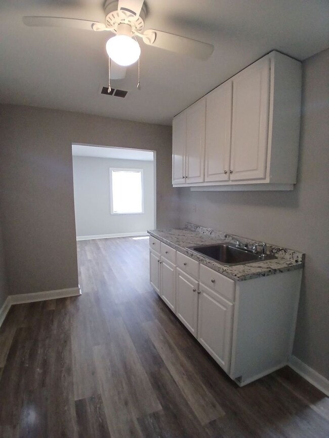 Building Photo - Renovated 3-Bedroom Gem on a Quiet Residential Street - Open To Section 8