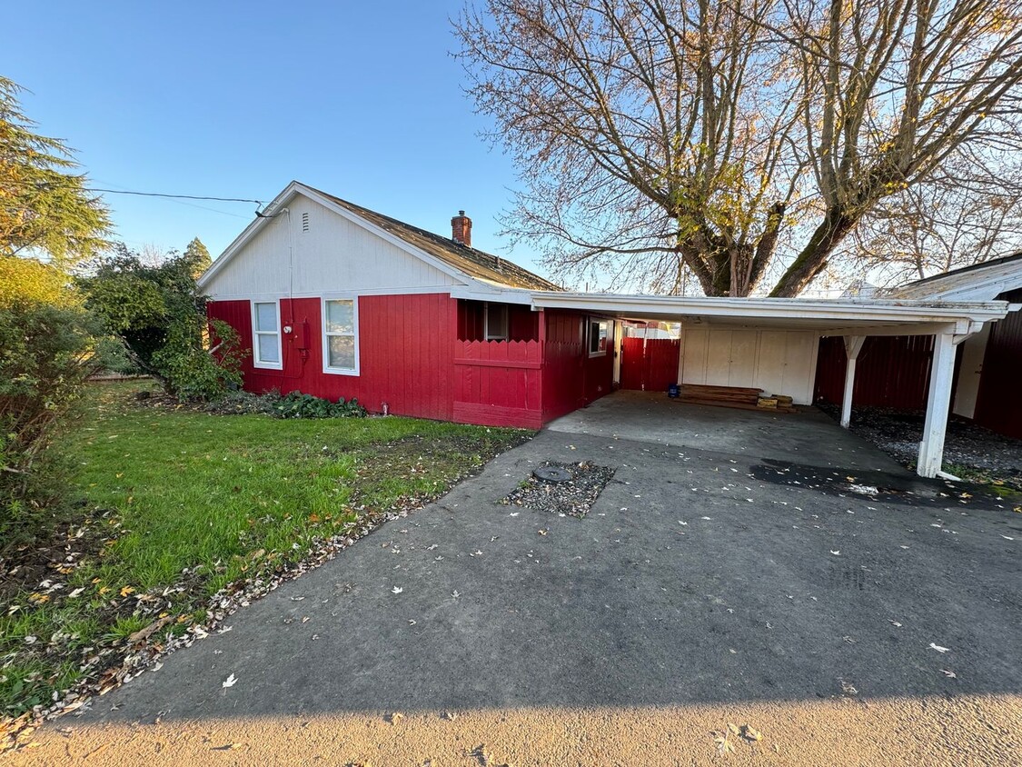 Primary Photo - House with garage, carport, yard, & shed