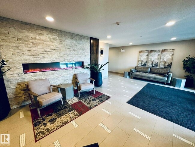 Building Photo - #320 1506 TAMARACK BV NW