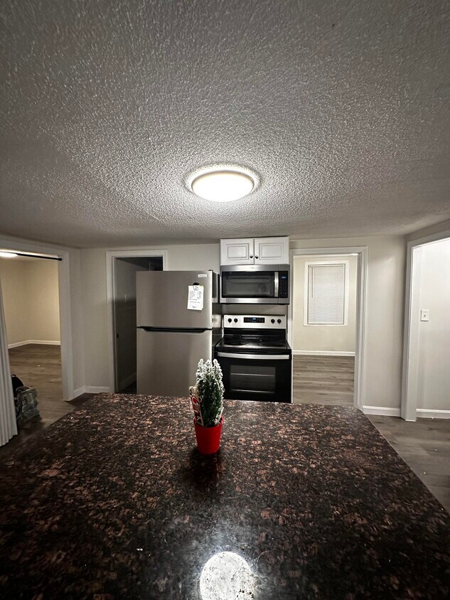 Kitchen with stainless steel appliances - 33 Sumner St