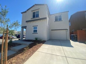 Building Photo - 6824 Mangosteen Ln