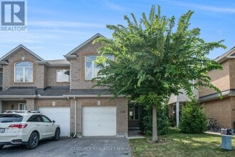 Building Photo - 108 Talltree Crescent