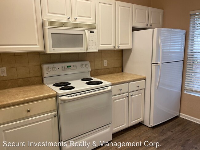 Building Photo - 2 br, 2.5 bath House - 4961 NW 43rd Avenue...