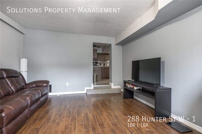 Building Photo - Cozy & Updated 1-Bedroom Apartment on a Charming Tree-Lined Street