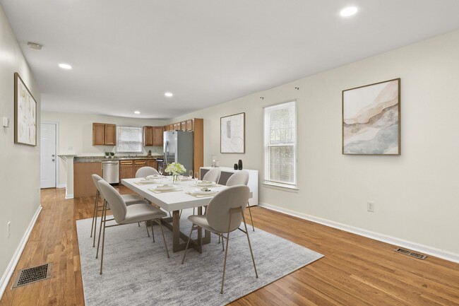 Spacious dining area opens to a stylish, inviting kitchen - perfect for gatherings - 247 Farrington Ave SE