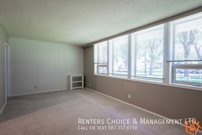 Building Photo - Main Floor Unit Secured Entry, Elevator, G...